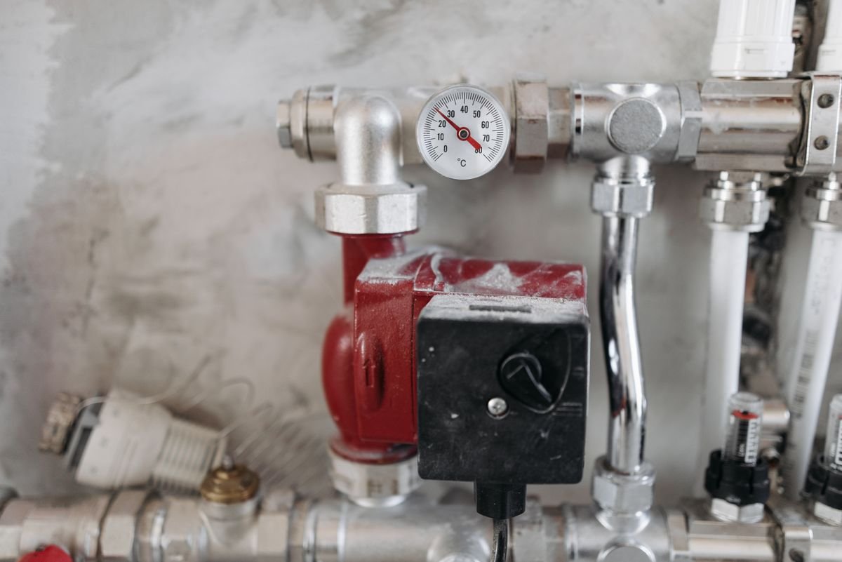 Circulation pump with pressure gauge on a piping system