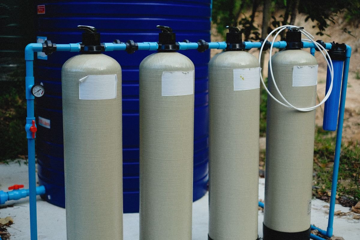Water softener and filtration vessels with pressure gauge and piping